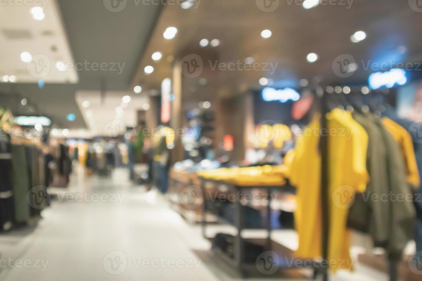 loja de roupas de desfoque abstrato no fundo desfocado do shopping moderno foto