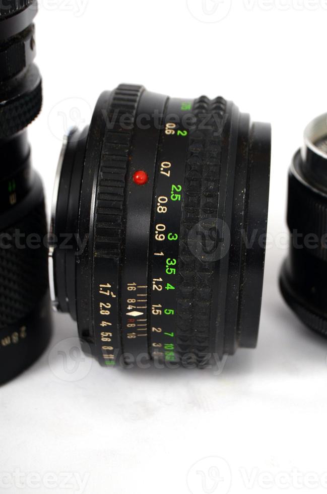 lente da câmera de controle manual antigo isolada no branco foto