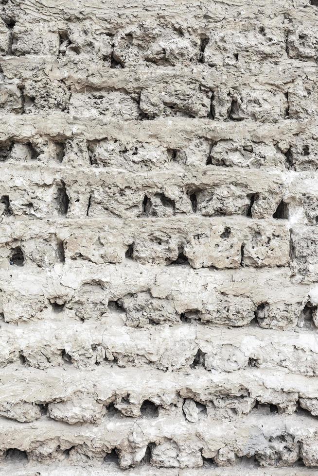 parede de tijolos brancos. parede de concreto branco sujo foto
