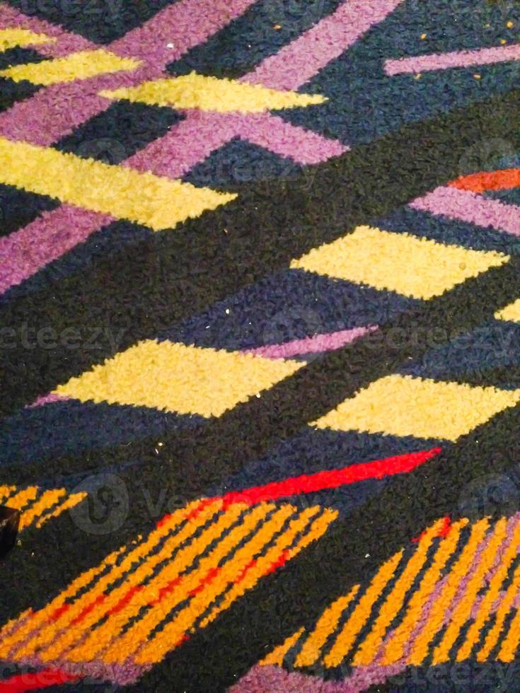 Superfície do tapete colorido estilo peruano tailandês close-up foto