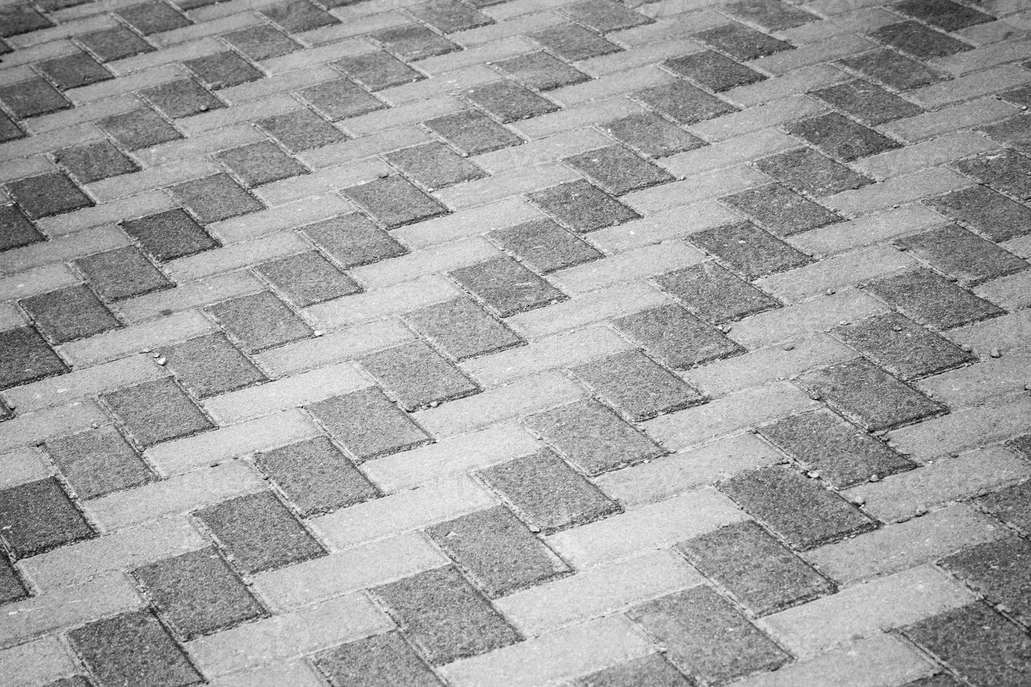 textura cinzenta da foto do fundo do pavimento urbano à beira da estrada
