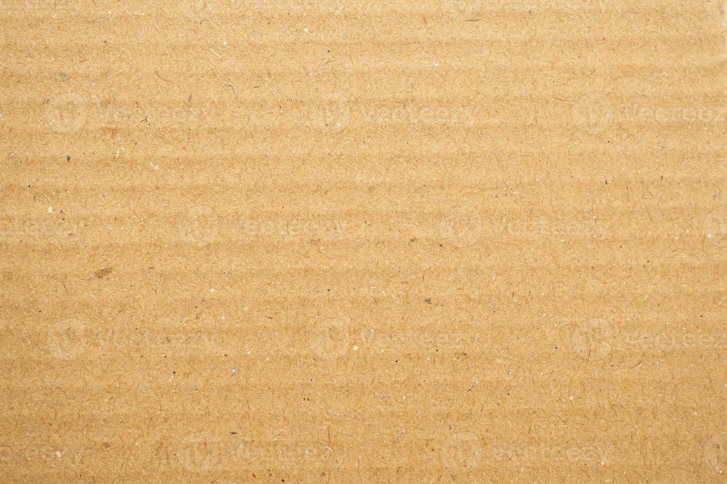fundo de textura de papel de papelão reciclado marrom abstrato foto