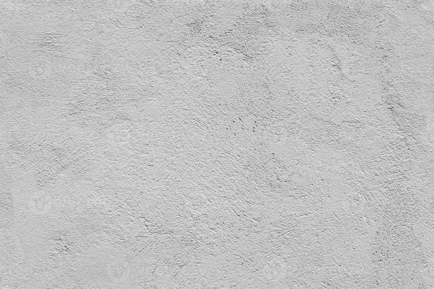 textura perfeita e fundo de quadro completo de acabamento de gesso cinza áspero de uma parede de construção ao ar livre foto