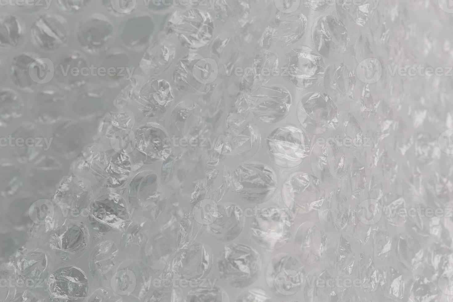 envoltório de bolha de ar amassado - fundo de close-up da vida real foto