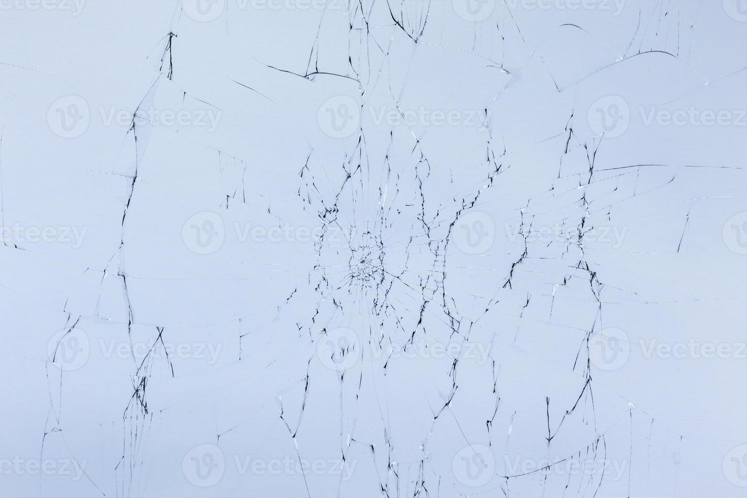 textura plana de tela tft lcd de vidro rachado com rachaduras radiais localizadas foto