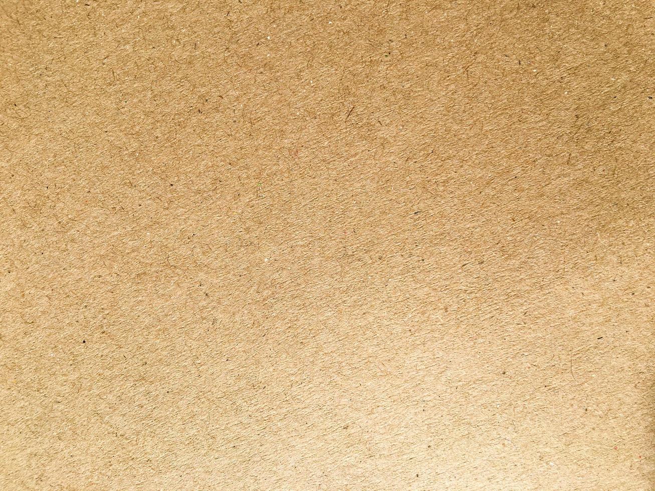 antigo fundo de textura de papel pardo ou papelão com espaço de cópia para design. foto