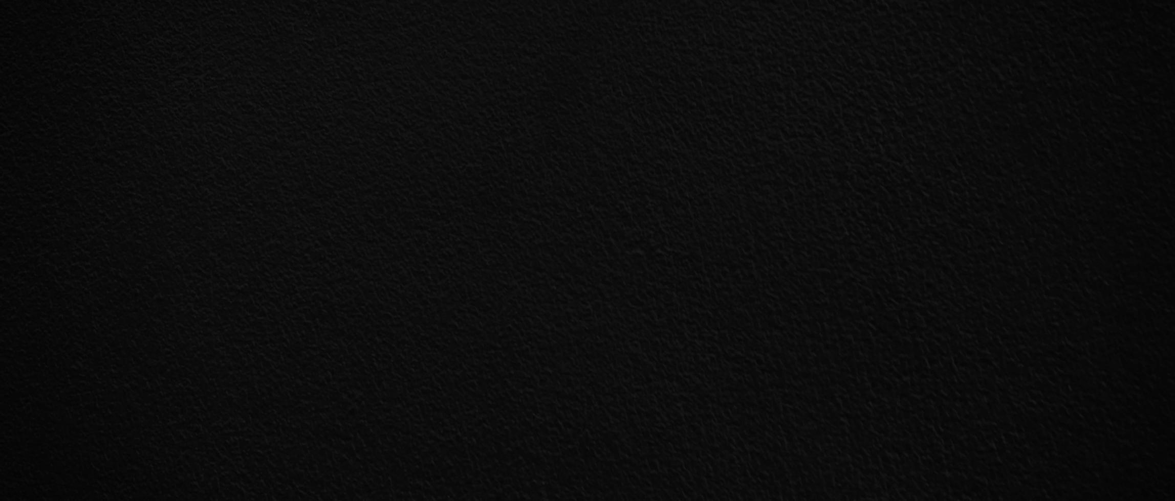 textura de parede de cimento preto em branco para plano de fundo com espaço de cópia para design foto