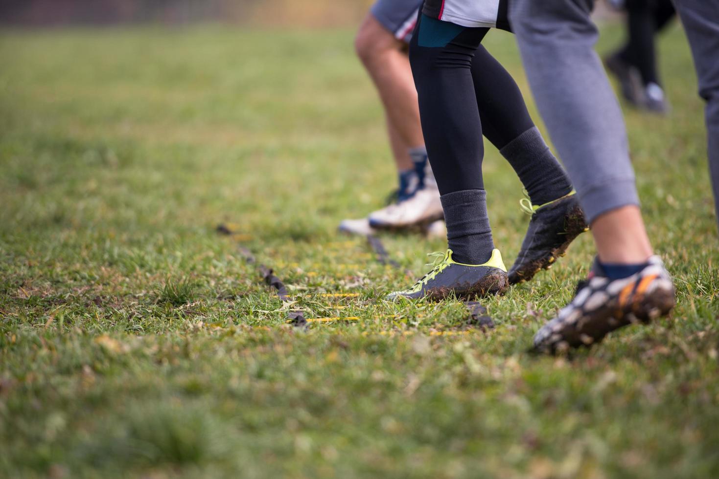 exercícios de time de futebol americano em brocas de escada foto