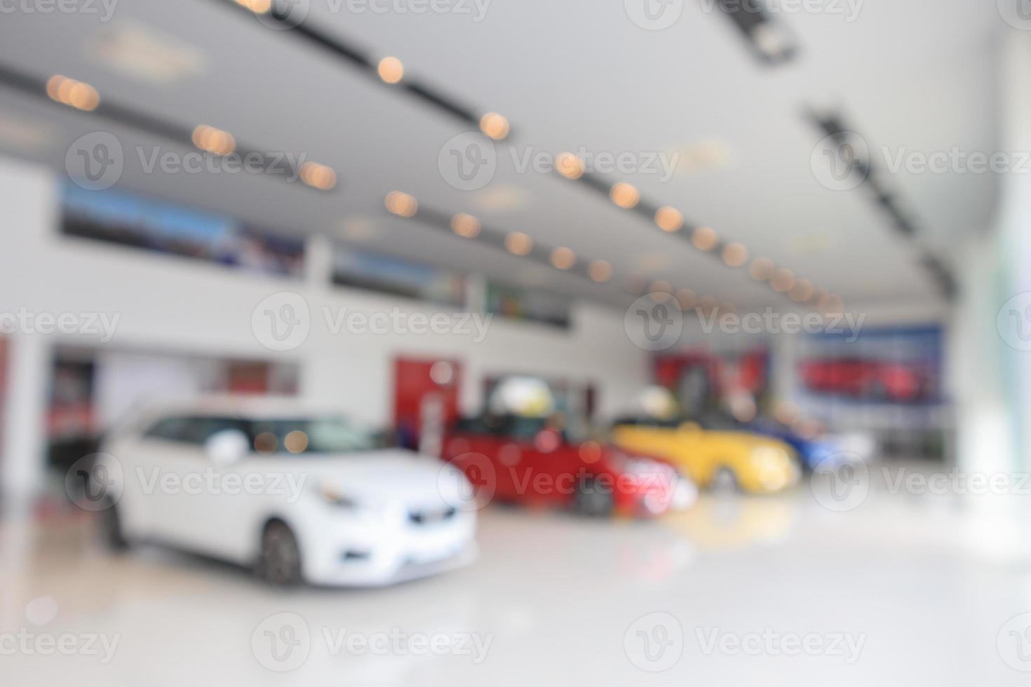 carros novos no showroom desfocado fundo desfocado foto