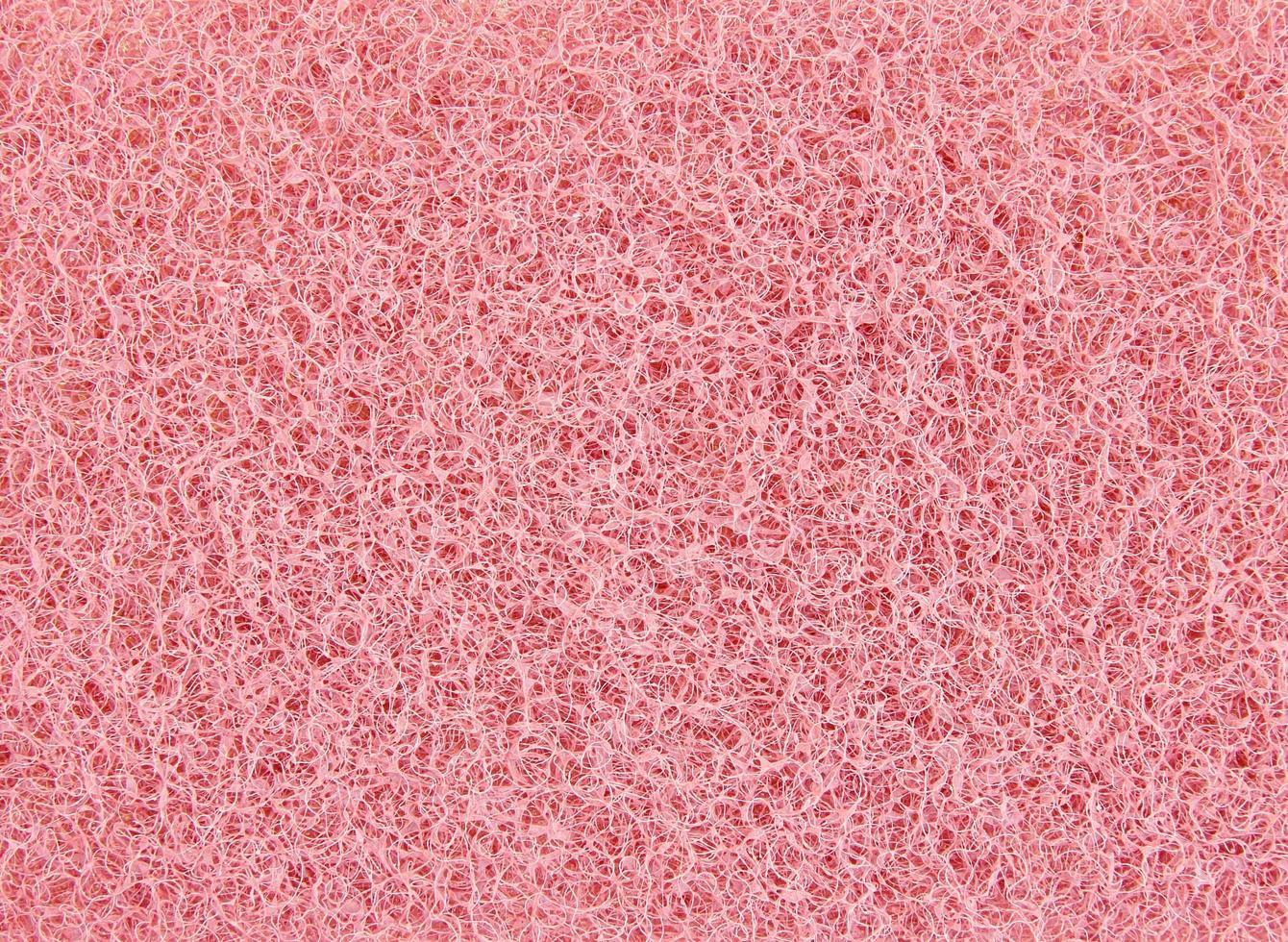textura de esponja vermelha abstrata para plano de fundo foto