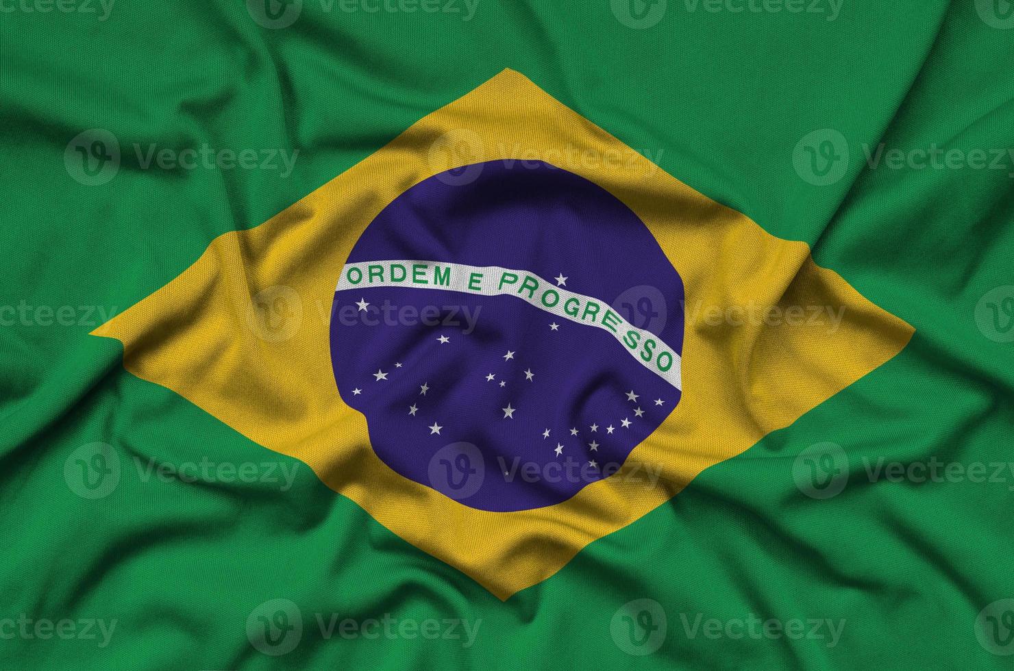 a bandeira do brasil é retratada em um tecido esportivo com muitas dobras. bandeira da equipe esportiva foto