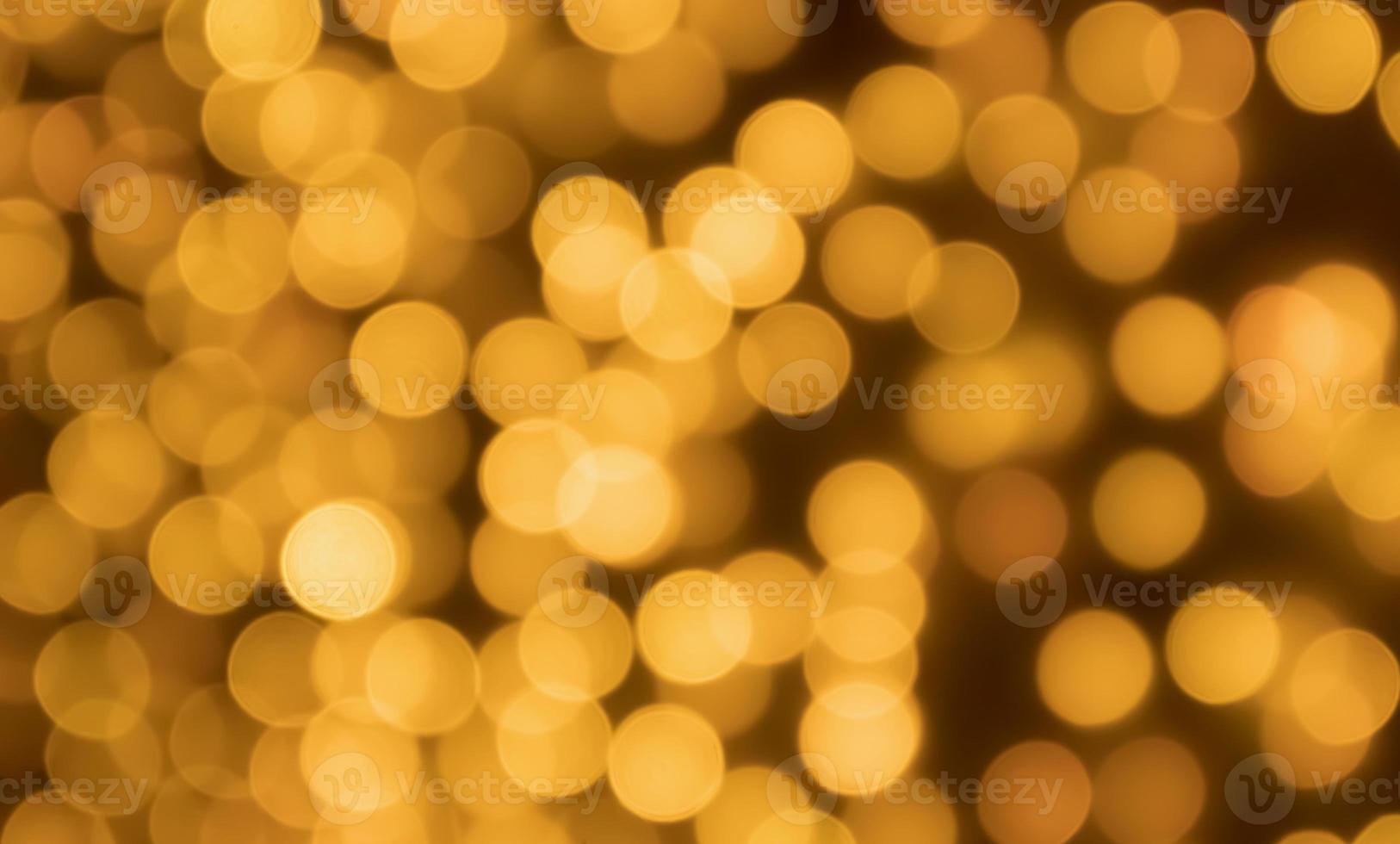 abstrato borrão dourado bokeh luz fundo de férias de natal foto