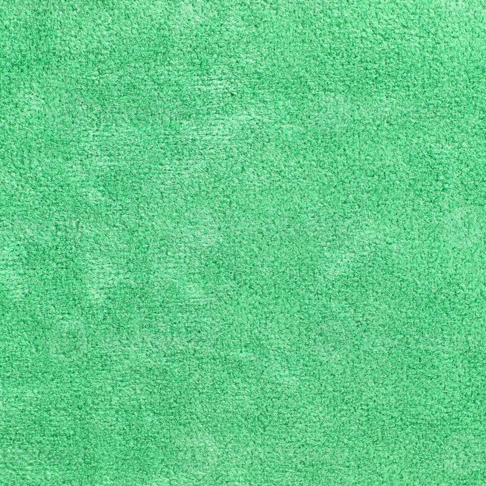 textura de tapete verde para fundo foto