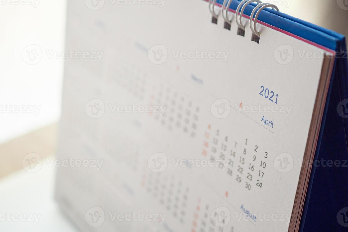 conceito de reunião de compromisso de planejamento de negócios de plano de fundo de página de calendário 2021 foto