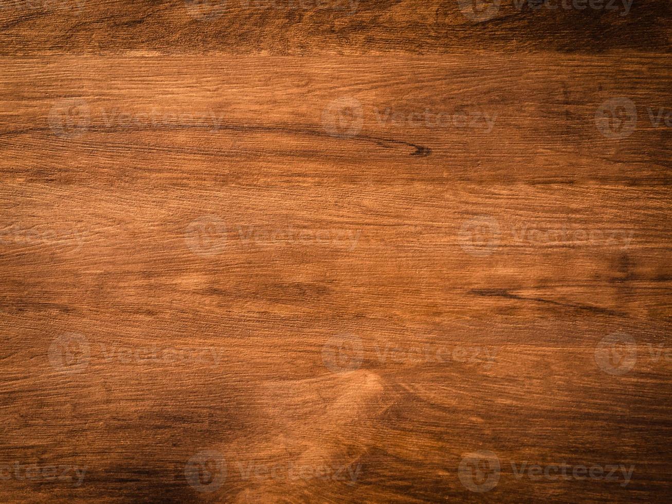 uso de textura de madeira de nogueira como plano de fundo natural com espaço de cópia para design. foto
