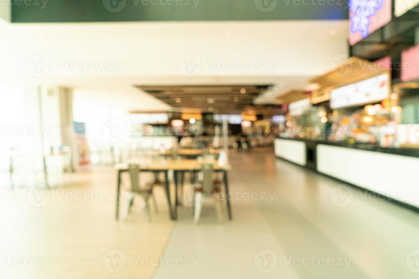 borrão abstrato praça de alimentação em shopping center foto