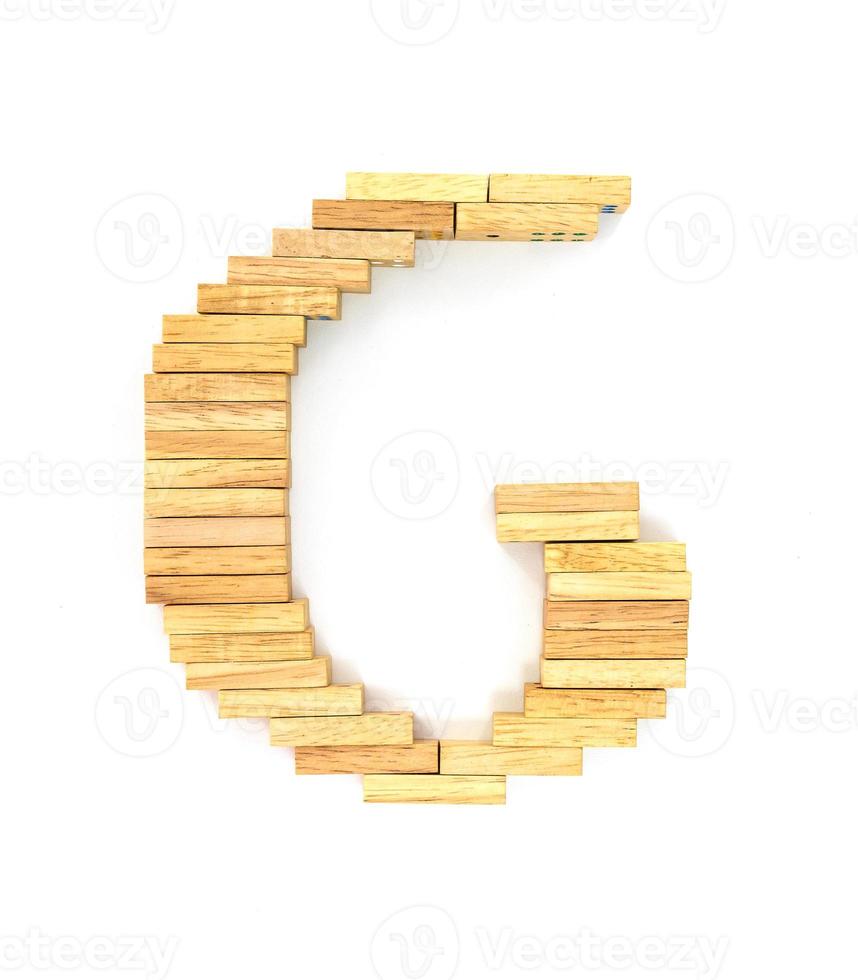 alfabeto de dominó de madeira, g foto