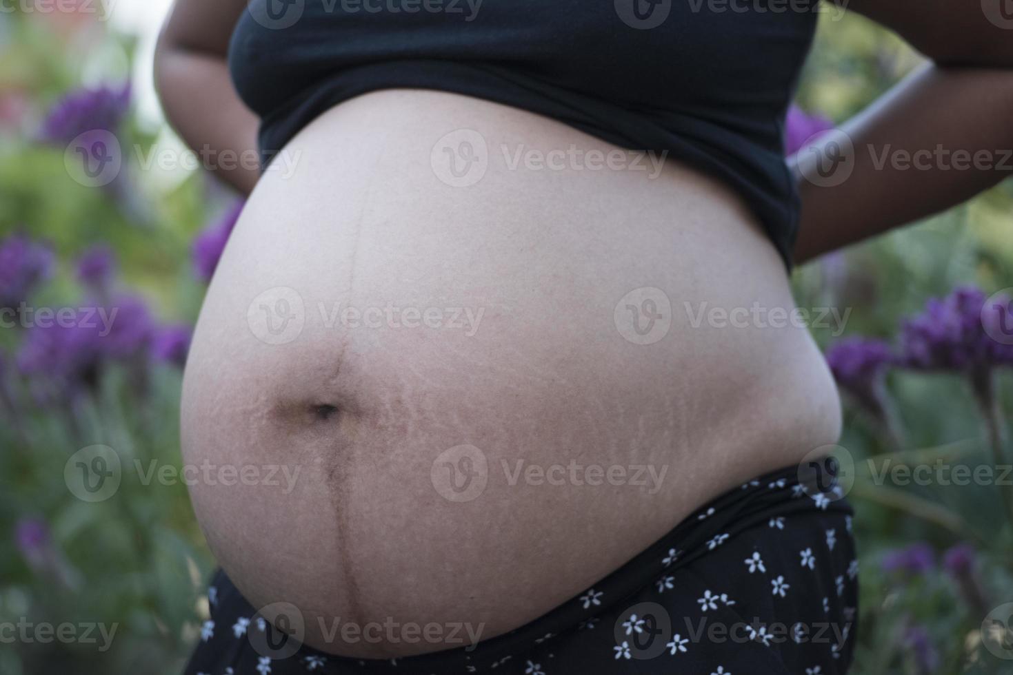 barriga de mulher grávida. conceito de gravidez foto