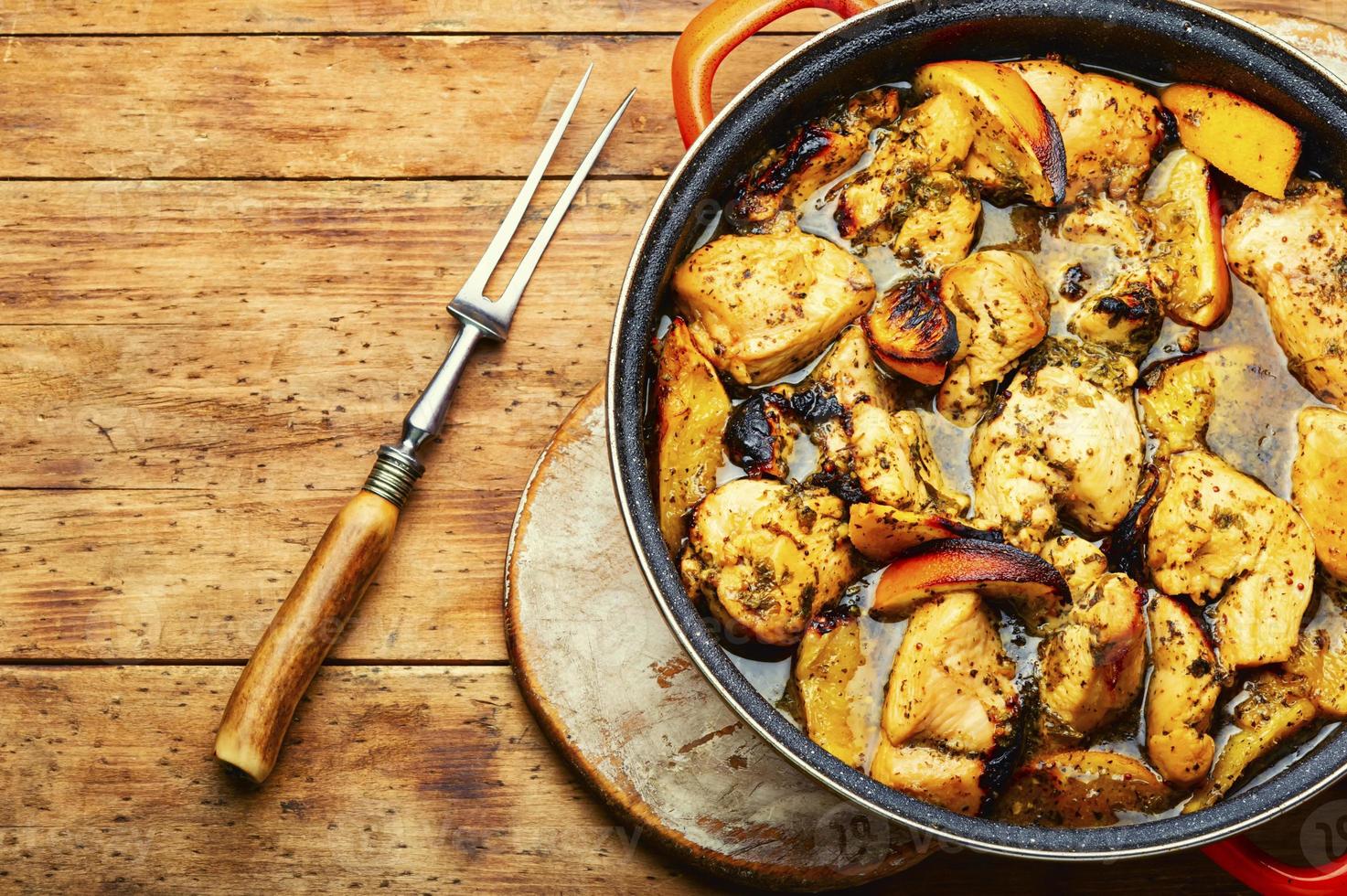 carne de frango assada com laranja. foto