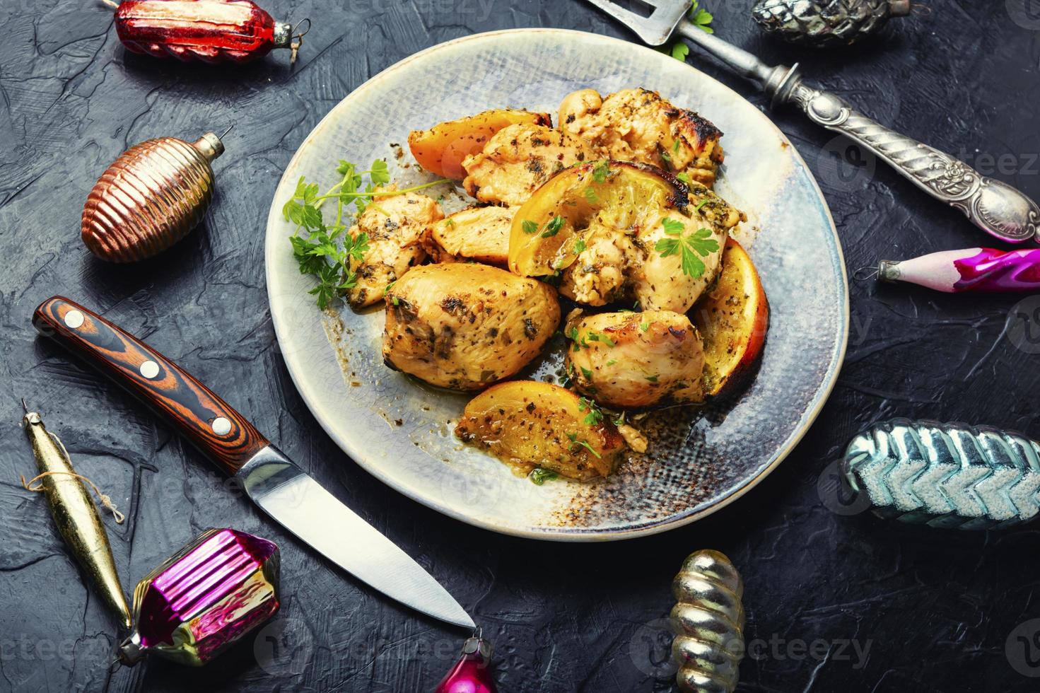 carne de frango assada com laranja. foto