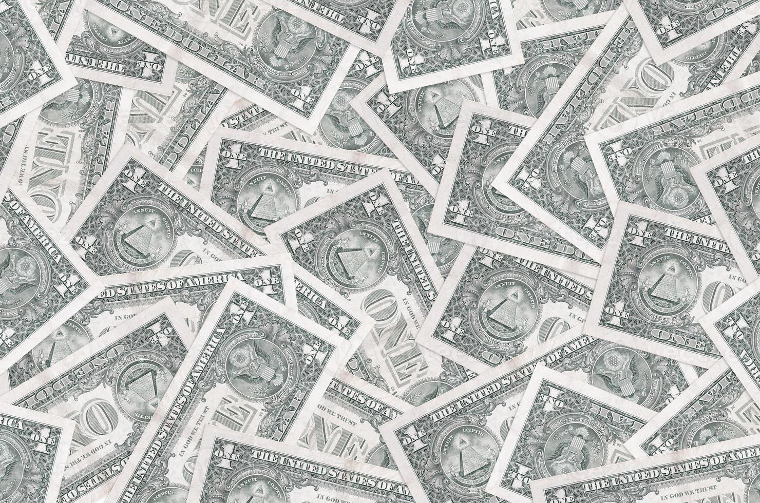 1 notas de dólar americano encontram-se na pilha grande. fundo conceitual de vida rica foto