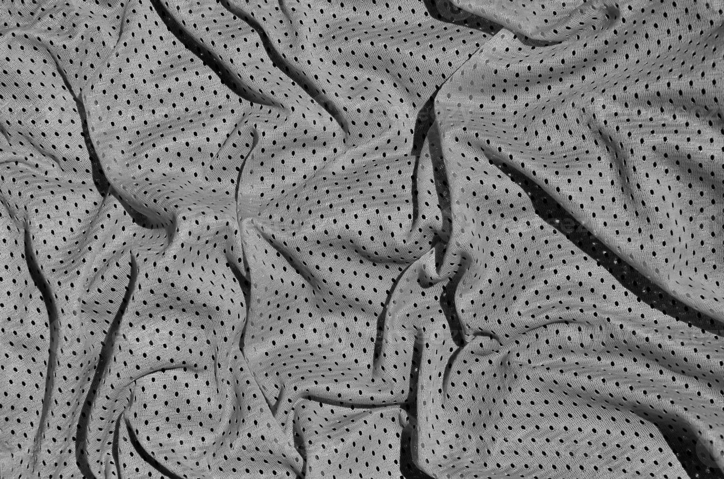 close-up de shorts esportivos de nylon poliéster cinza para criar um plano de fundo texturizado foto