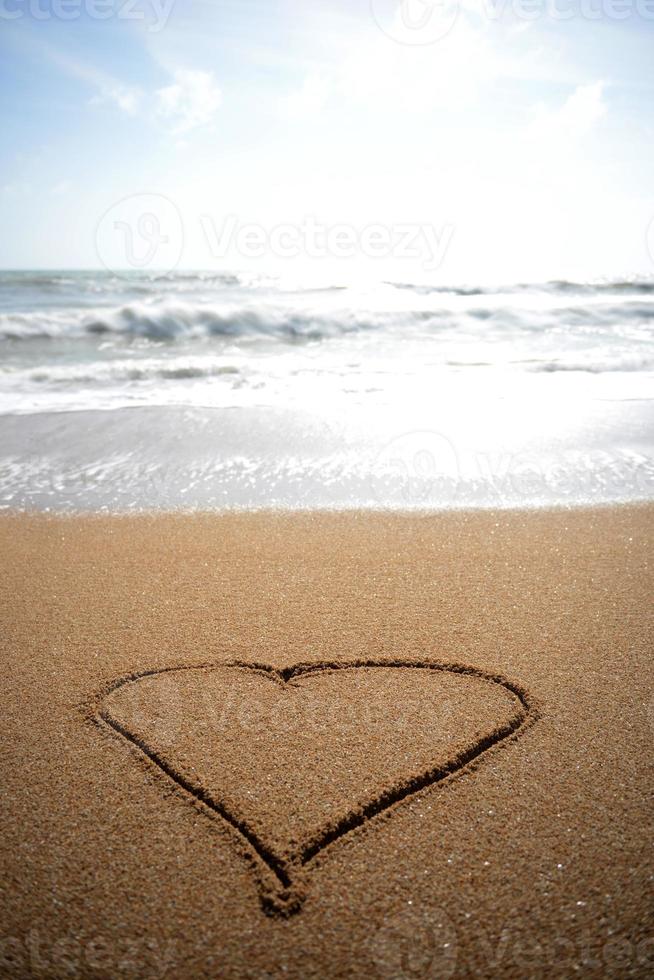 coração na areia foto