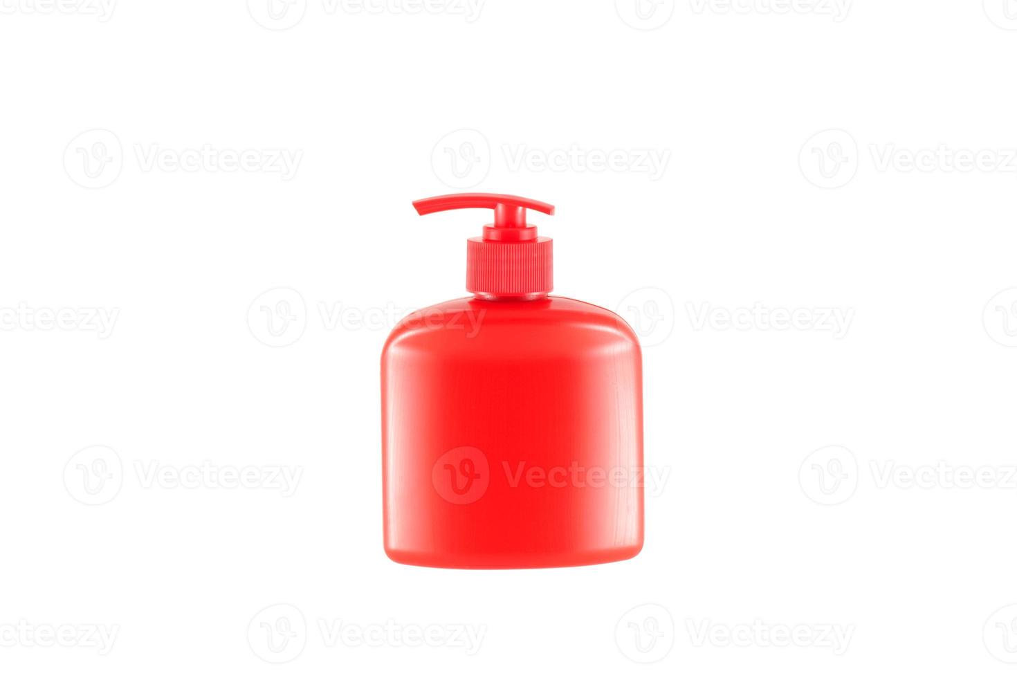 frasco vermelho para sabonete líquido de um distribuidor. foto