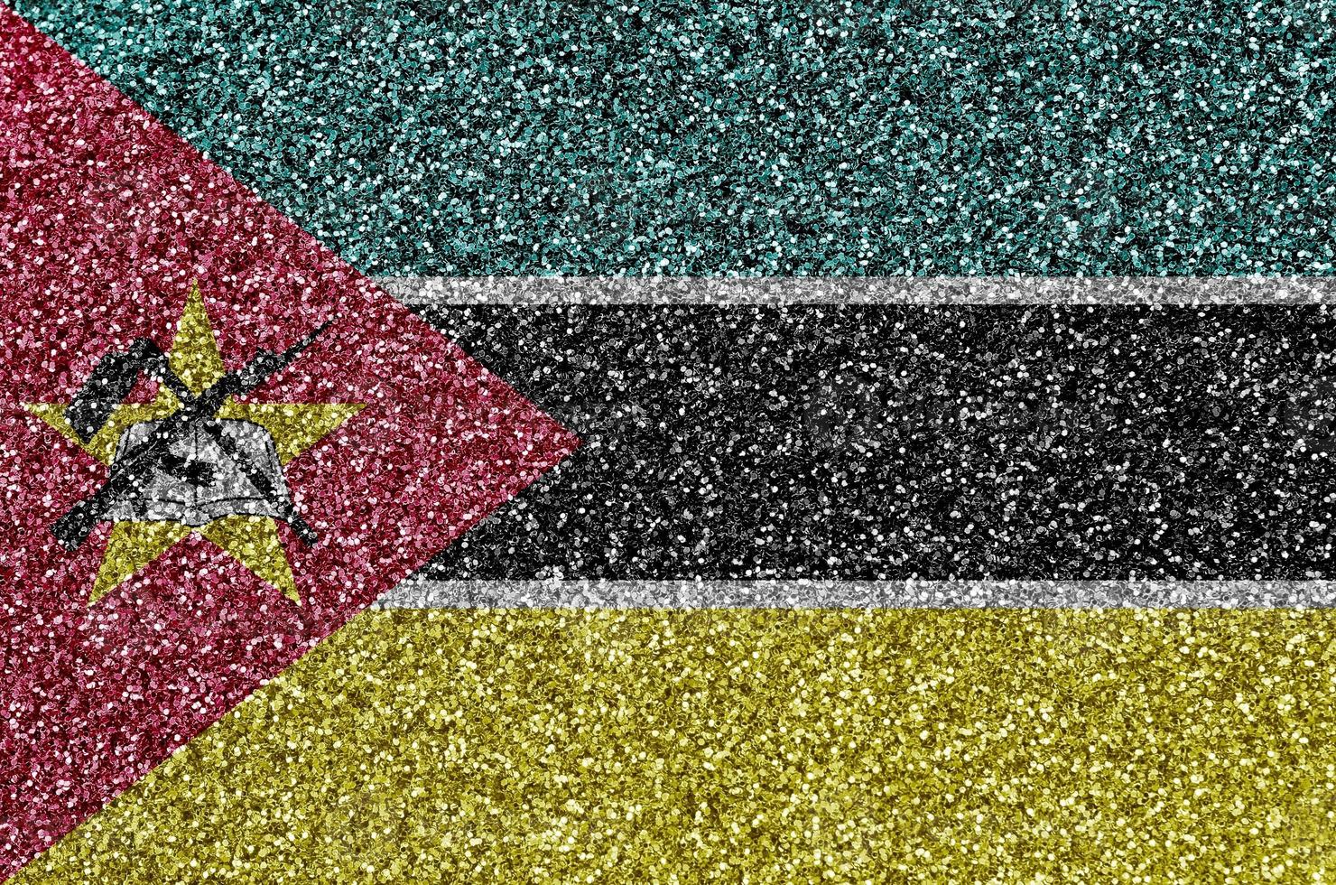 bandeira de moçambique retratada em muitas pequenas lantejoulas brilhantes. fundo colorido festival para festa foto