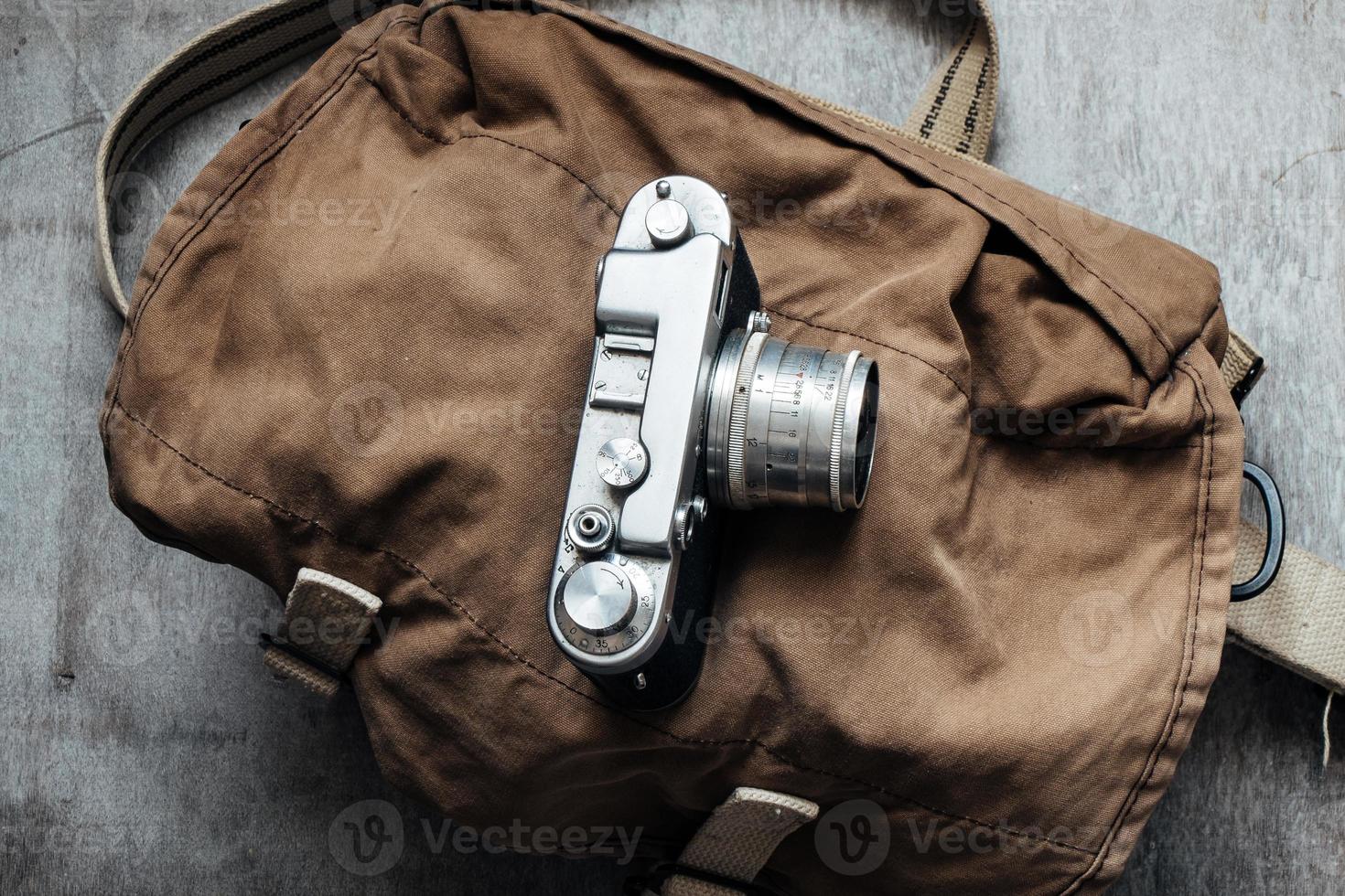câmera velha na bolsa, componente de design vintage de foto grunge