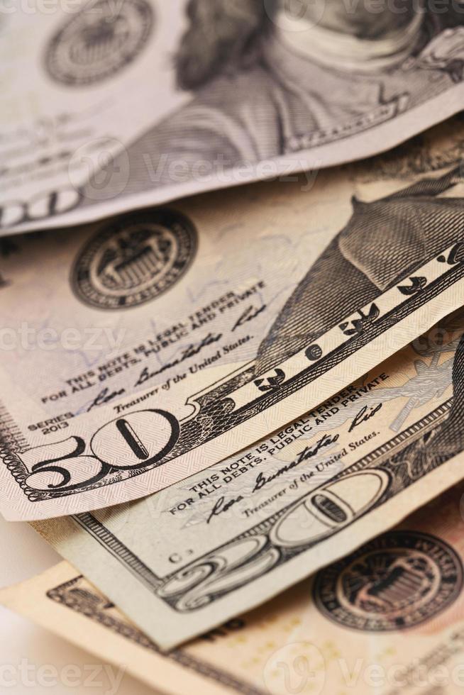 close-up das diferentes notas de dólar americano foto