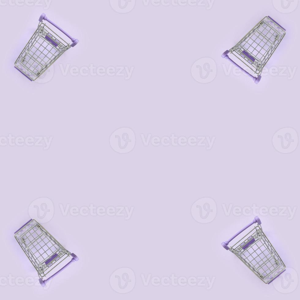 padrão de muitos pequenos carrinhos de compras em um fundo violeta. vista superior plana do minimalismo foto