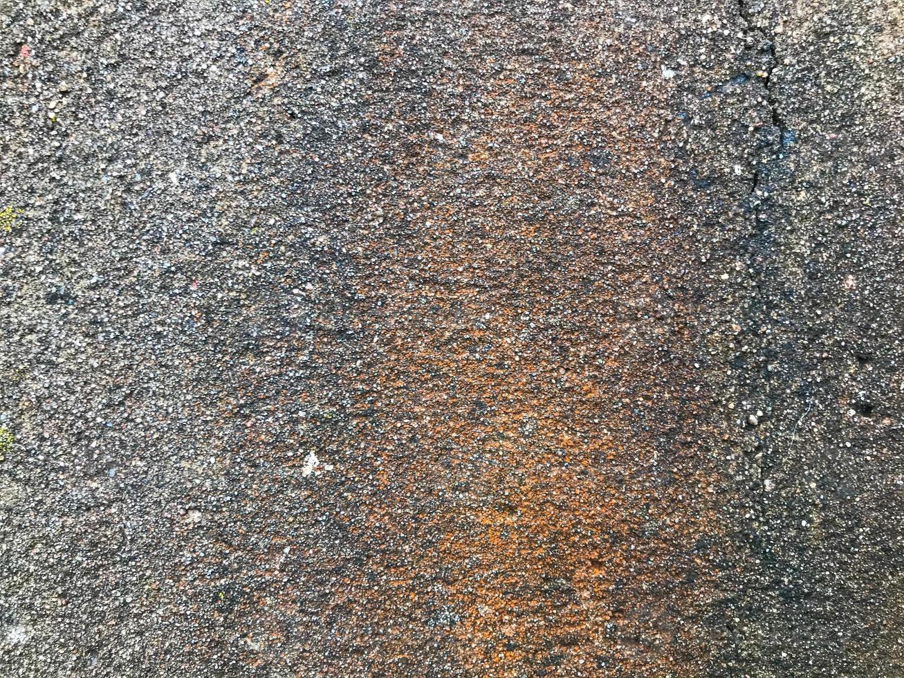 textura de pedra natural. fundo natural, pedra cinza. tiro macro de um anel para fazer um poço. textura de cinza com tons de laranja com pedrinhas foto