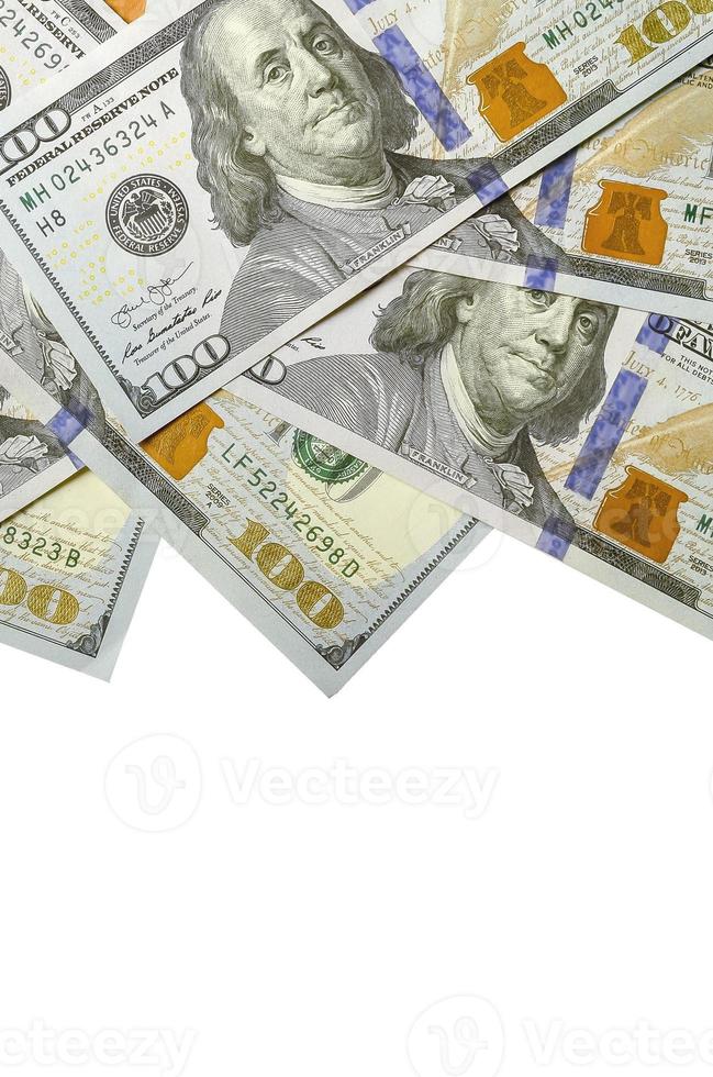 contas em dólar. dinheiro americano isolado em branco com espaço de cópia foto