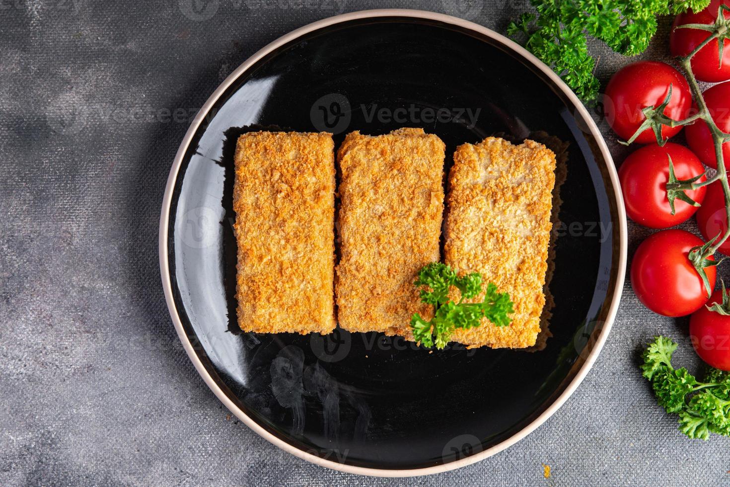 palitos de peixe frutos do mar fritos lanche delicioso refeição saudável lanche de comida na mesa cópia espaço fundo de comida foto