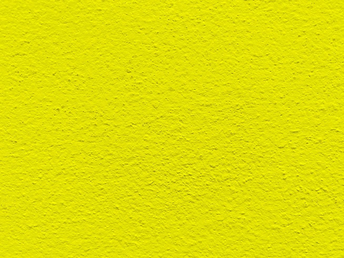 textura perfeita da parede de cimento amarelo uma superfície áspera, com espaço para texto, para um fundo. foto