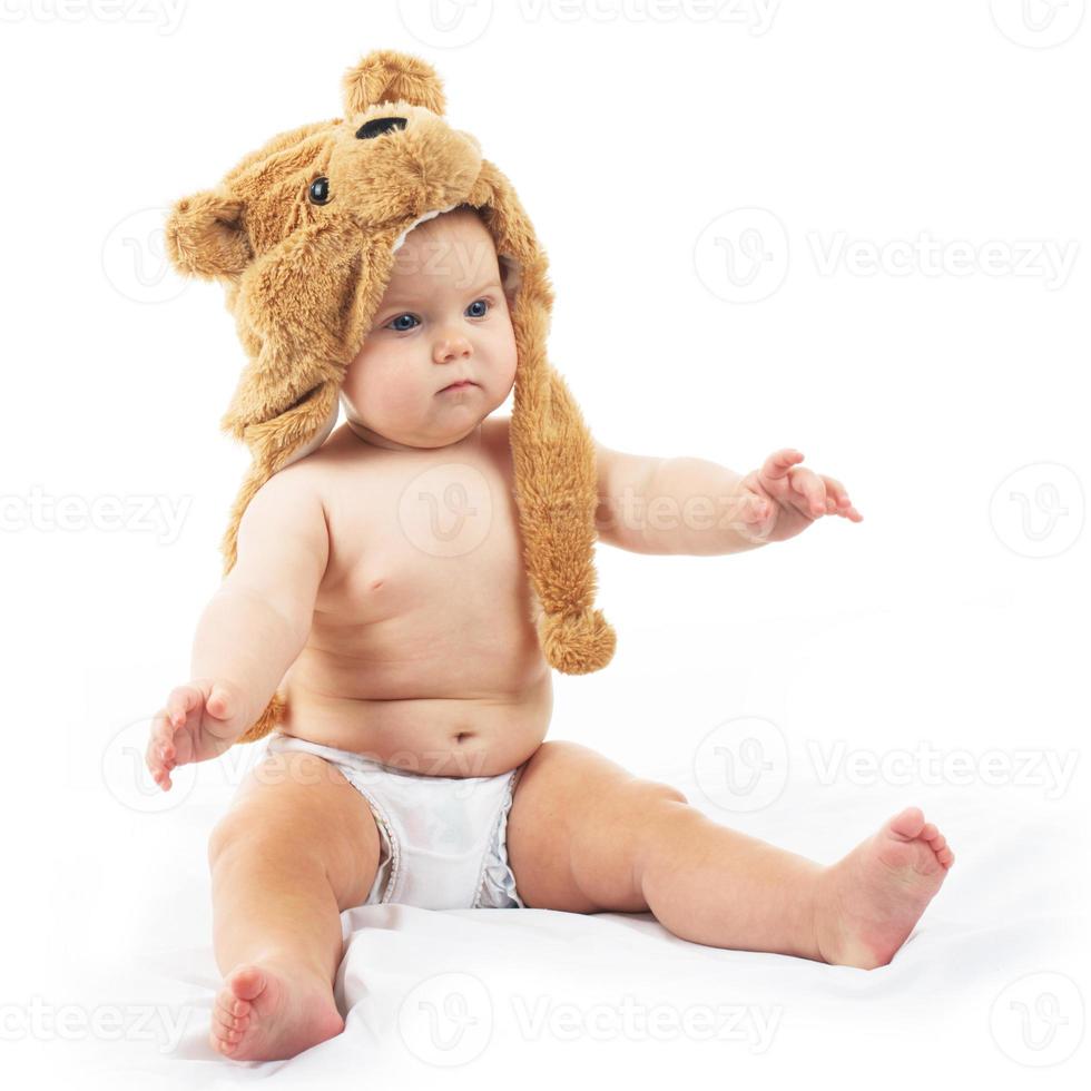 bebê em gorro de urso foto