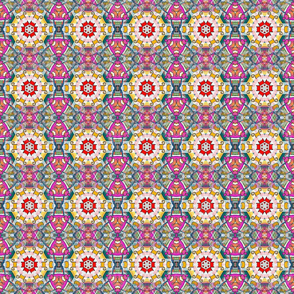 fundo abstrato do caleidoscópio. bela textura de caleidoscópio multicolor. design de caleidoscópio exclusivo. com cores base vermelho e rosa foto