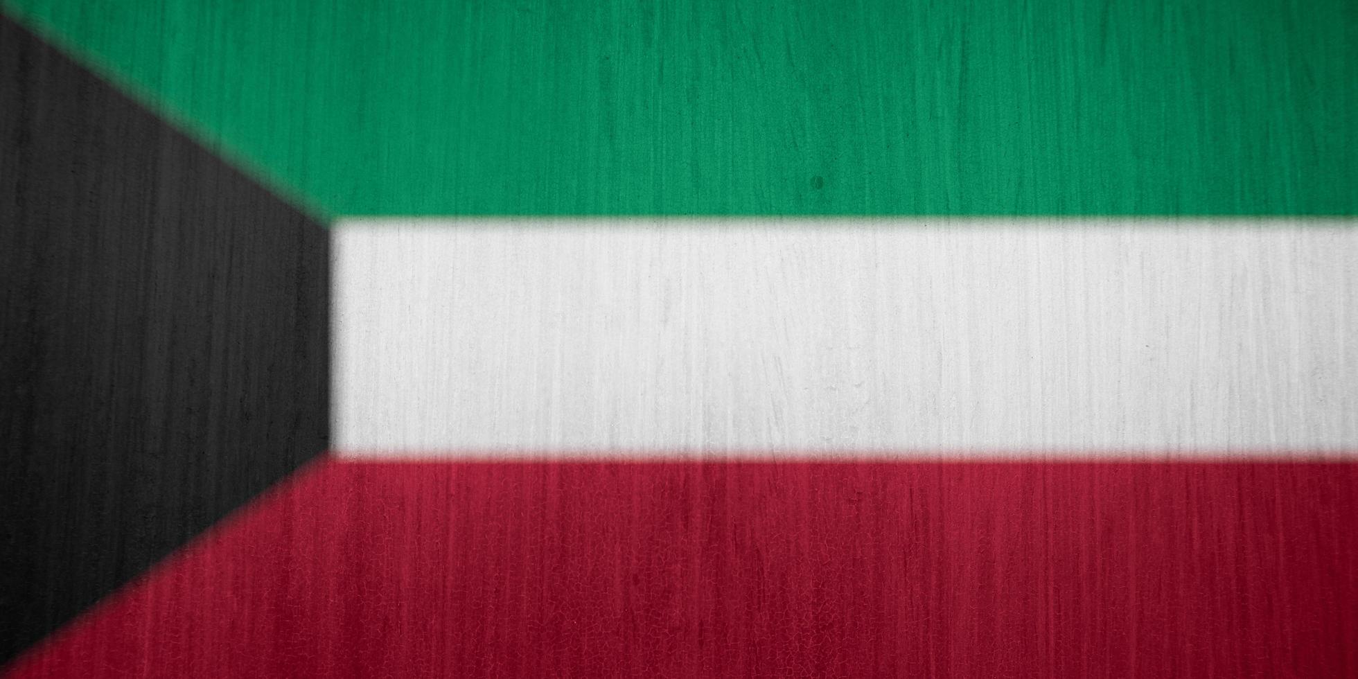 textura da bandeira do Kuwait como plano de fundo foto