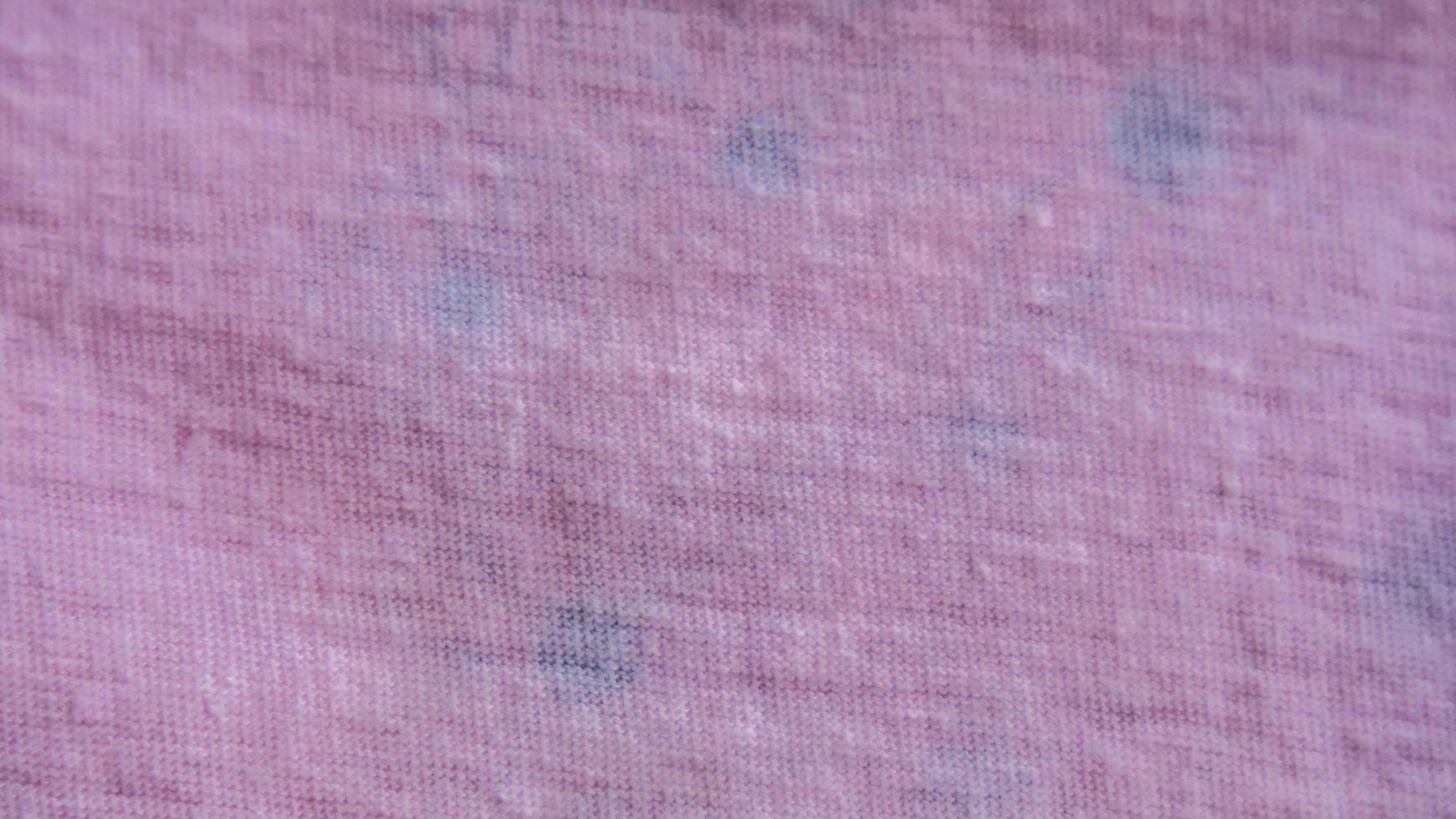 textura de pano rosa como plano de fundo foto