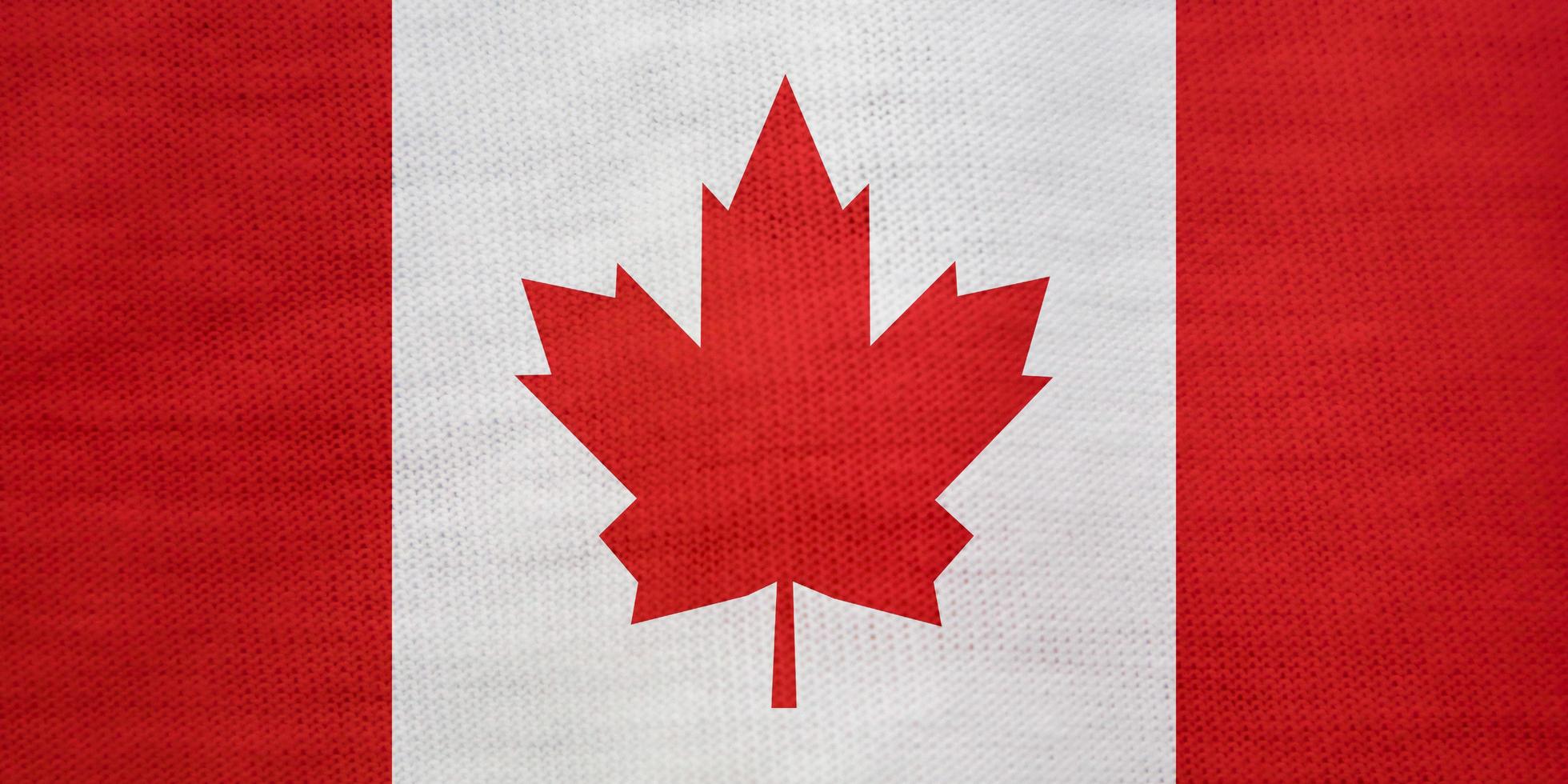 textura da bandeira canadense como plano de fundo foto