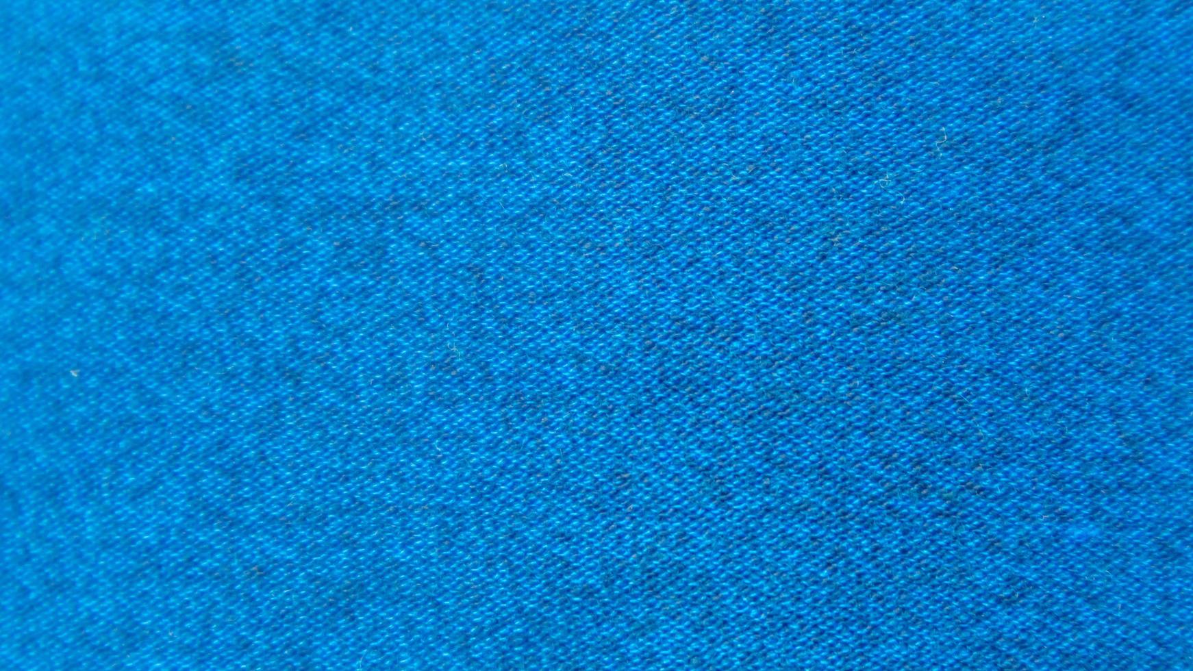 textura de pano azul como plano de fundo foto