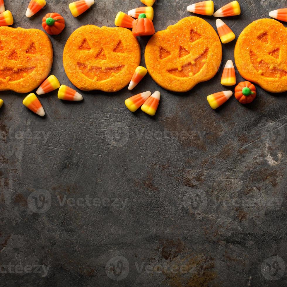 biscoitos e doces de abóbora de halloween foto