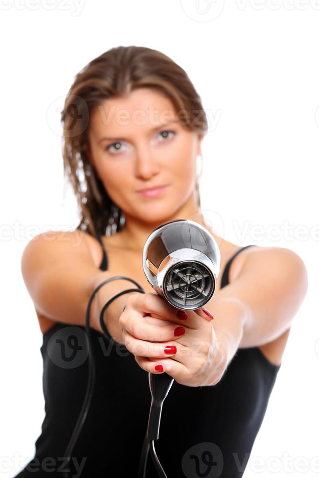 jovem mulher com uma arma foto