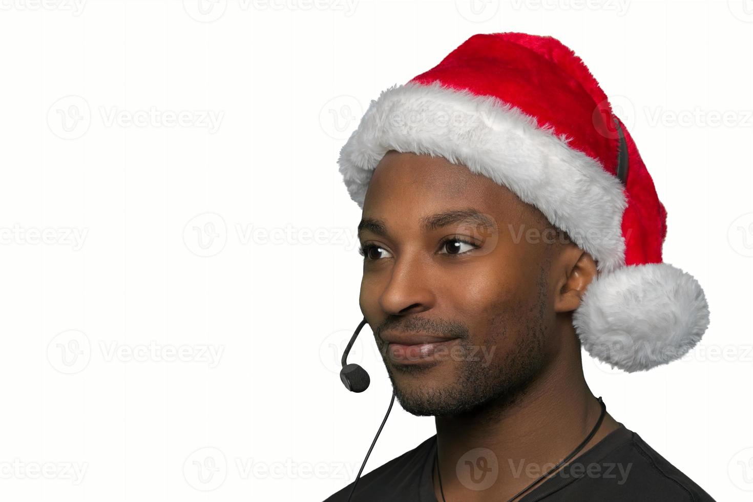 central de suporte de natal atendimento ao cliente linha de ajuda chapéu de papai noel vermelho recepcionista de escritório fone de ouvido em fundo branco foto