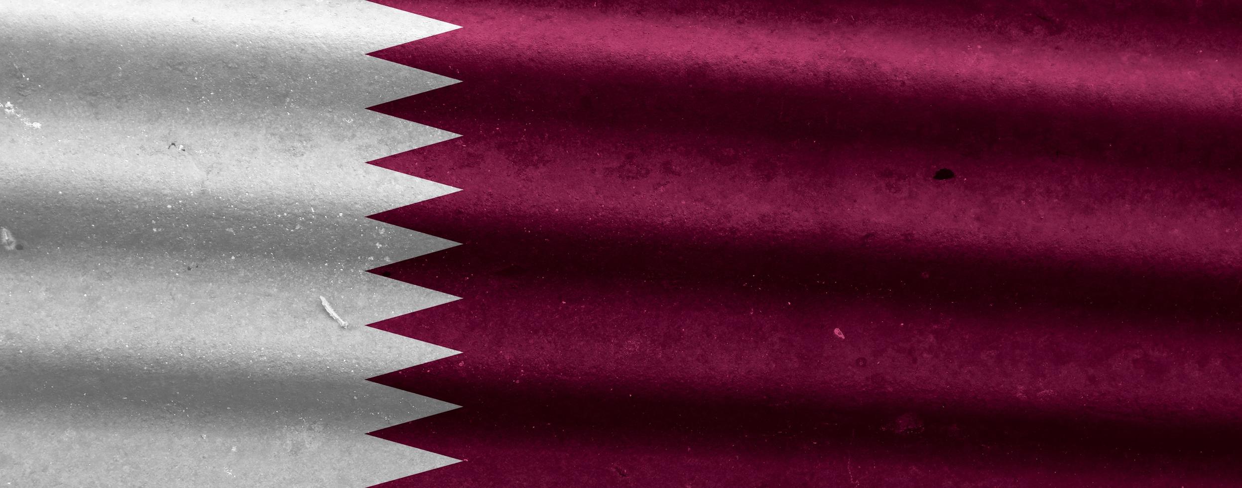 textura da bandeira do qatar como pano de fundo foto