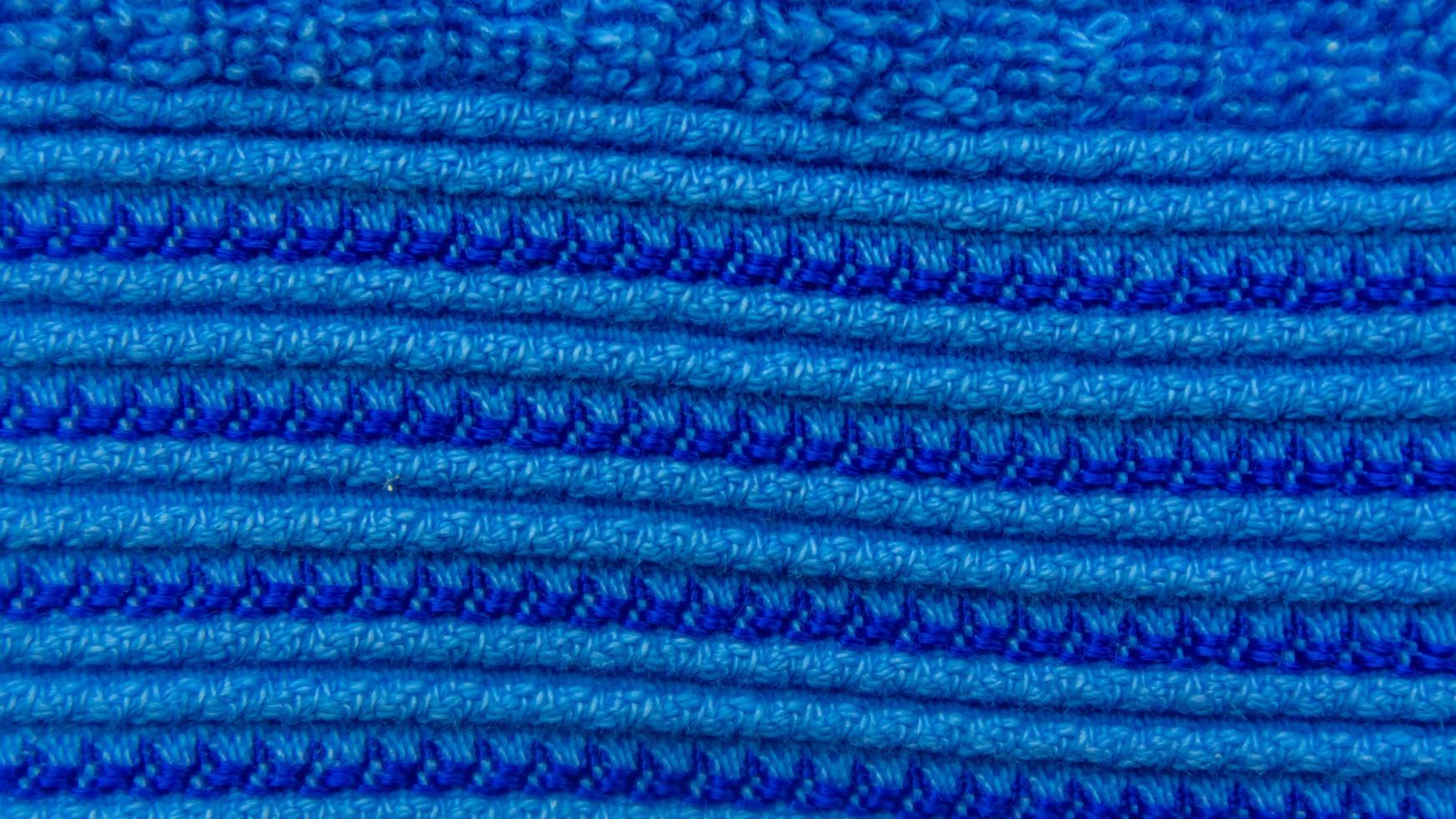 textura de toalha azul como pano de fundo foto