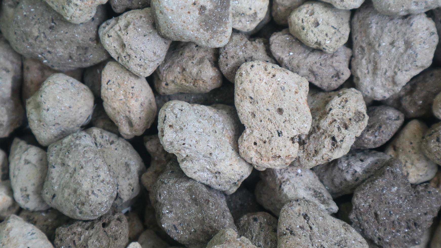 textura de superfície detalhada de uma pilha de pedra-pomes como pano de fundo foto