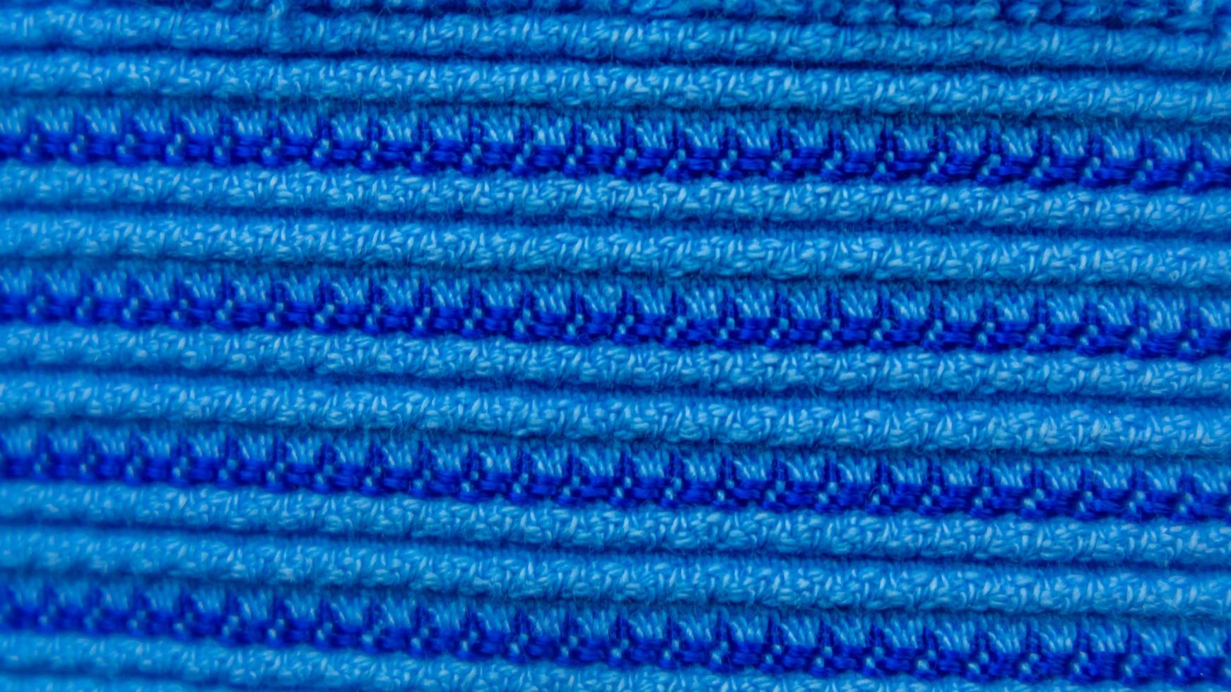 textura de toalha azul como pano de fundo foto