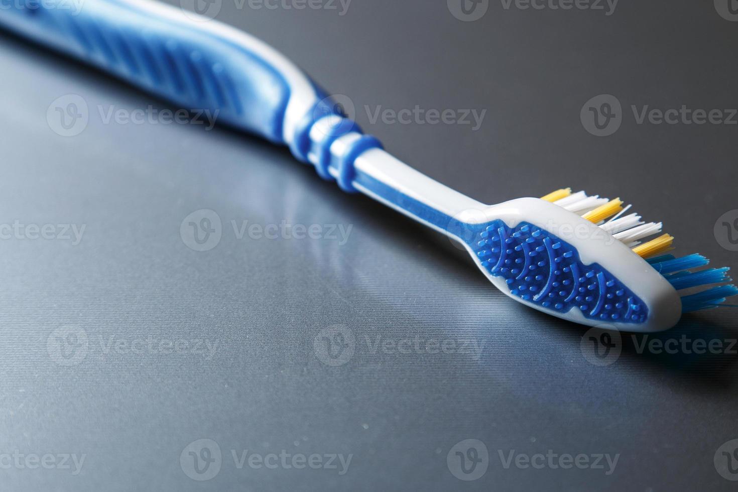 close-up de escova de dentes colorida foto